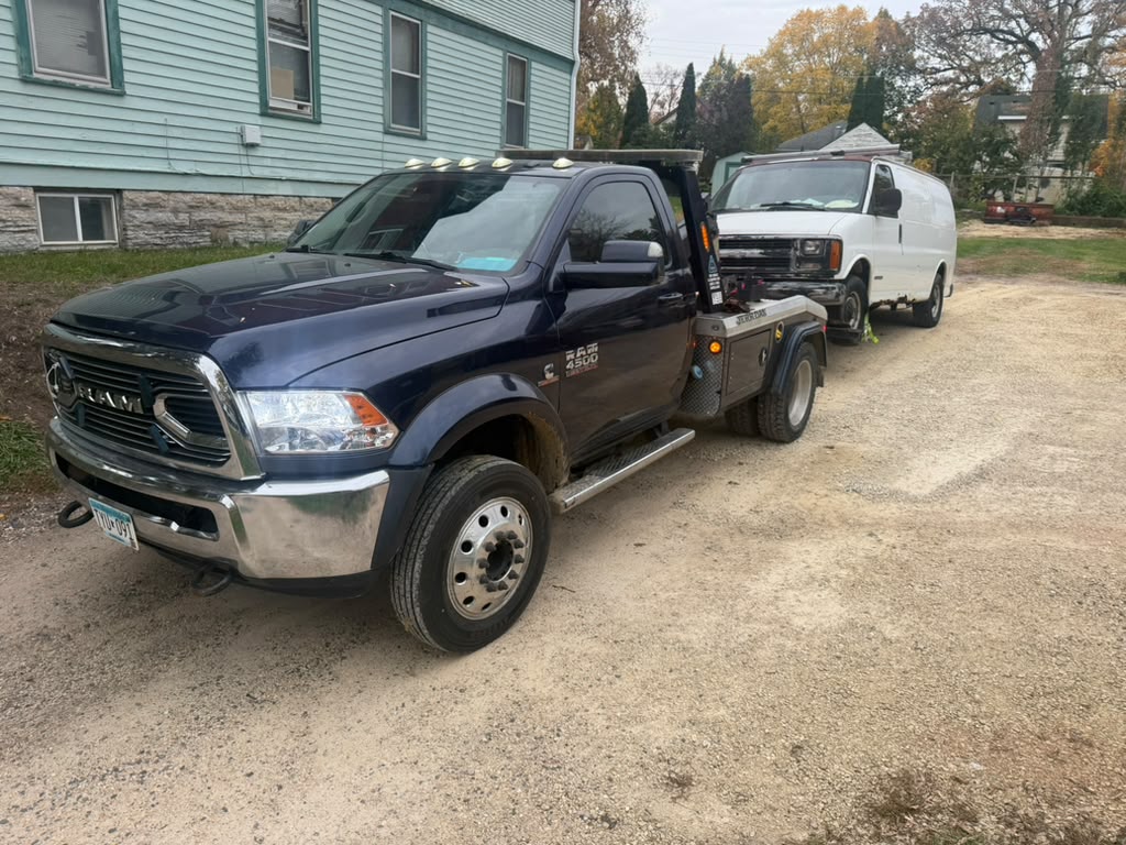 Twins Towing truck towing a van